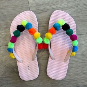 Pom Pom flip flops size 5